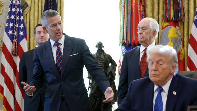 Secretary of Transportation Sean Duffy unsure of what's going on while President Trump looks await or sleeps in his oval office.
