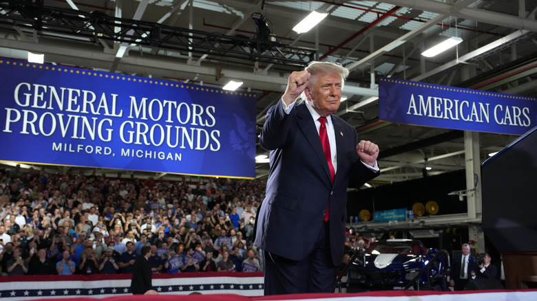 MILFORD, MICHIGAN - JULY 27: U.S. President Donald Trump dances after speaking at General Motors' Milford Proving Grounds on July 27, 2026 in Milford, Michigan. Trump is expected to address US auto manufacturing, tariffs and show support for Republican candidates ahead of the August 4 primary during the visit. (Photo by Andrew Harnik/Getty Images)
