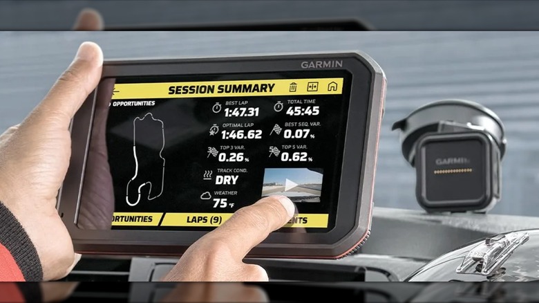 A person browsing through a Garmin Catalyst data recorder.